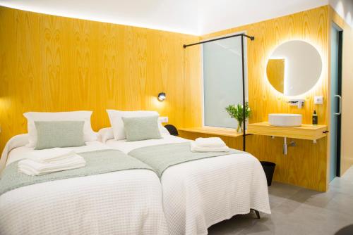 KALIDAS HOSTEL SUITESにあるベッド