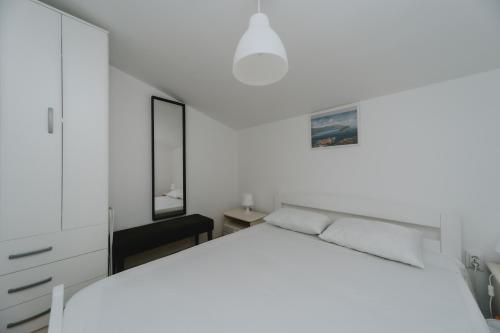 Кровать или кровати в номере Panoramic Apartment