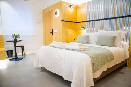 KALIDAS HOSTEL SUITESにあるベッド
