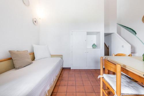 Postel nebo postele na pokoji v ubytování Domus Carlotta Apartment with sea view Villasimius