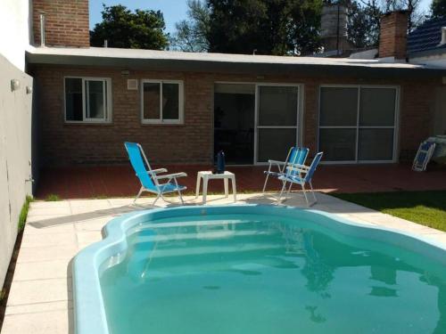 Casa Arco Iris. Agradable monoambiente con piscina y jardín