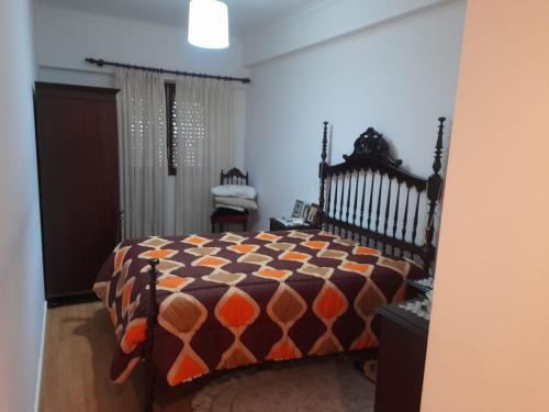 Кровать или кровати в номере Apartamento em Moscavide