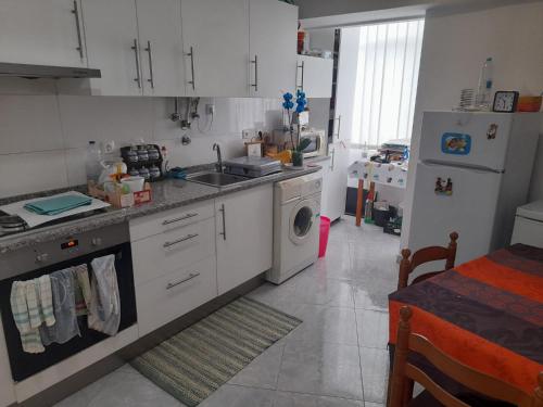Köök või kööginurk majutusasutuses Apartamento em Moscavide