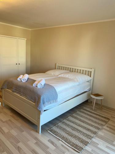 a bedroom with a bed with two pillows on it at Appartement Am Waldweg in Achern