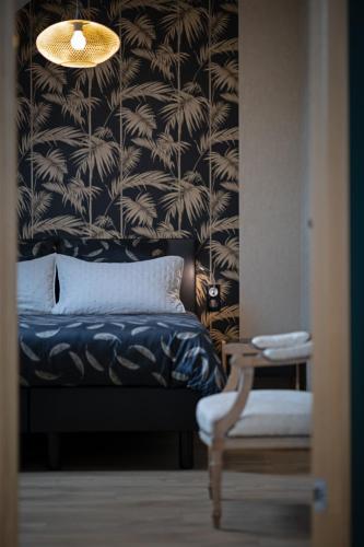 Una cama o camas en una habitación de Gîte Serenida