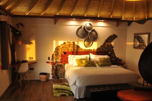 Postel nebo postele na pokoji v ubytování Mango Island Lodges