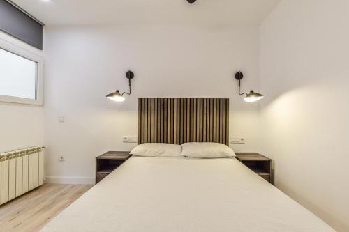 Säng eller sängar i ett rum på MyHouseSpain - Fantastico piso nuevo cerca del centro