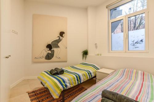 เตียงในห้องที่ MyHouseSpain - Superb flat in Sanchinarro