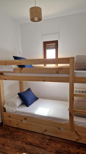 A bed or beds in a room at El Callejón