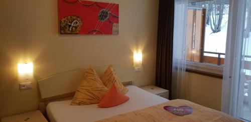 Katil atau katil-katil dalam bilik di Hotel Alex