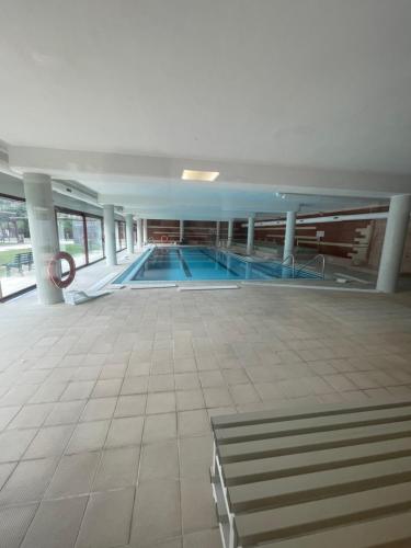A piscina localizada em Luminoso apartamento en Murcia ou nos arredores