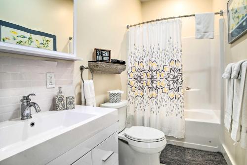 a bathroom with a sink and a toilet and a shower at Modern Apt Near Marthas Vineyard Beaches! in Oak Bluffs