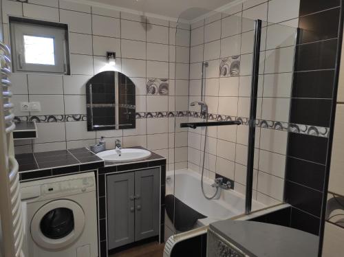 Kúpeľňa v ubytovaní Szofi Vendégház
