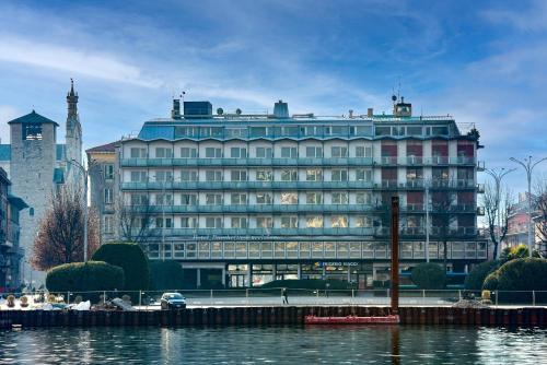 a large building next to a body of water at Il Vicolo in Como