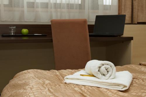Postel nebo postele na pokoji v ubytování Hotel Expo