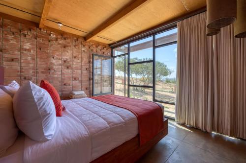 Postel nebo postele na pokoji v ubytování Maglen Resort