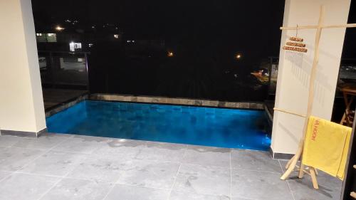 Πισίνα στο ή κοντά στο Appartement vue mer avec piscine privée à La Trinité, 98m²