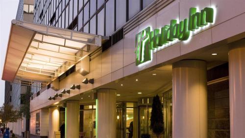 a building with a sign on the side of it at Holiday Inn Washington Capitol-National Mall, an IHG Hotel in Washington