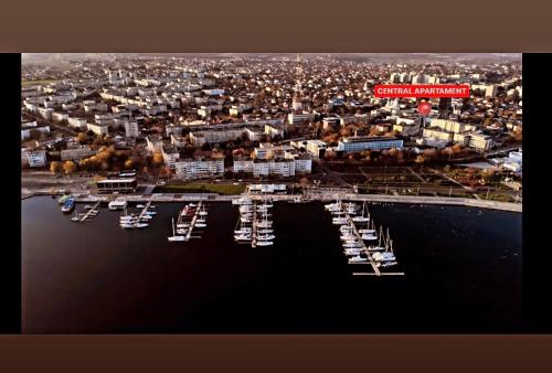 an aerial view of a harbor with boats in the water at Central Apartament Mangalia in Mangalia