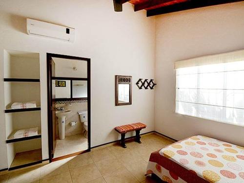 Ein Bett oder Betten in einem Zimmer der Unterkunft Cabañas Campestres Rincón de Apiay