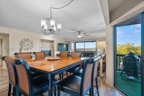 a dining room with a table and chairs at Hot Springs Vacation Rental with Game Room! in Hot Springs