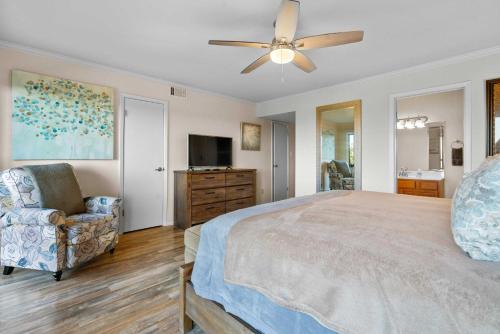 a bedroom with a bed and a ceiling fan at Hot Springs Vacation Rental with Game Room! in Hot Springs