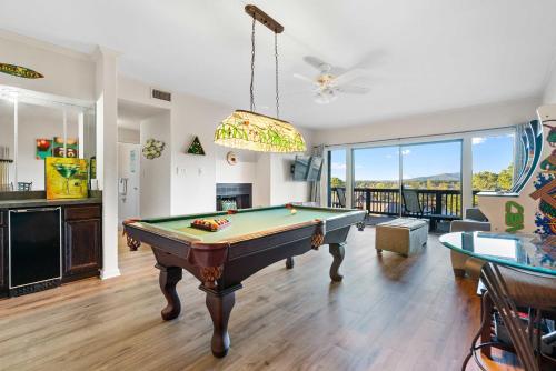 a living room with a pool table in it at Hot Springs Vacation Rental with Game Room! in Hot Springs