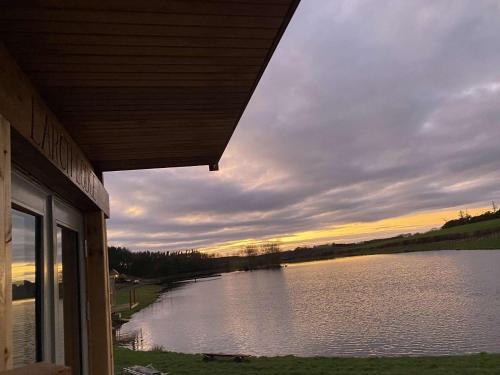 a view of a lake from a house at East Learmouth Lakeside Lodges in Cornhill-on-tweed