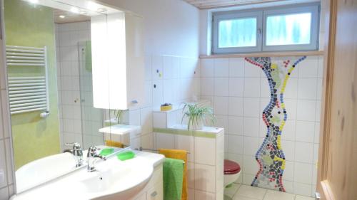 A bathroom at Ferienhaus Gartenlust