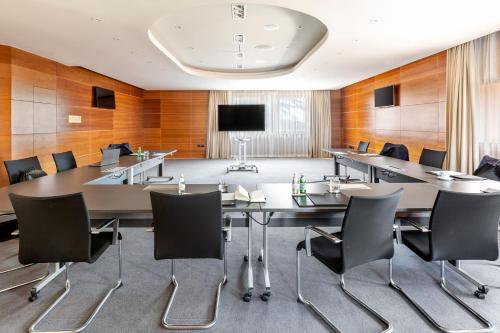 a conference room with a large table and chairs at JW Marriott Venice Resort & Spa in Venice