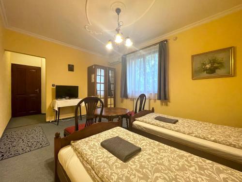 Posteľ alebo postele v izbe v ubytovaní Luxi Romantik Apartments