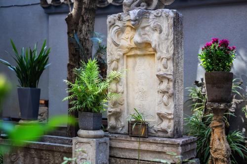 Ogród w obiekcie Aroma Tea House Former Jing Guan Ming Lou Museum Hotel
