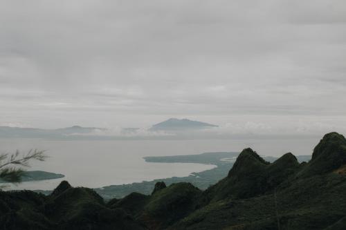 a view of the ocean from the top of a mountain at 150 Peakway Mountain Resort in Dalaguete
