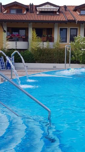 Der Swimmingpool an oder in der Nähe von apartment GiòHome