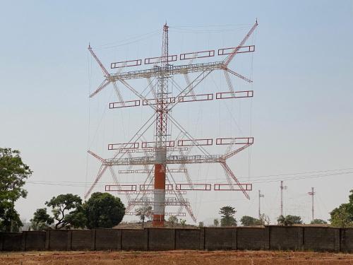 a large cell phone tower in a field at C7 Hazelwood Residence & Suites in Abuja
