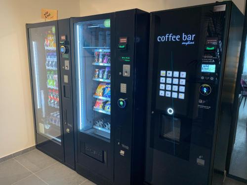 two vending machines are next to each other at wild & bolz eMotel in Trieben