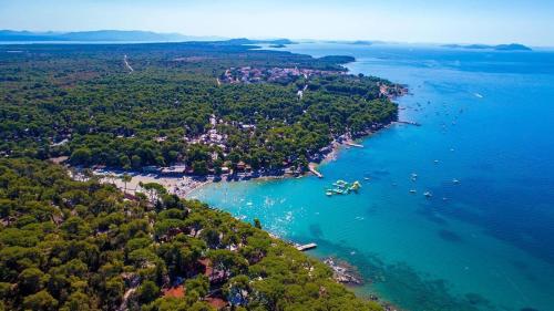 an aerial view of a small island in the water at Bajki Mobile home in Biograd na Moru