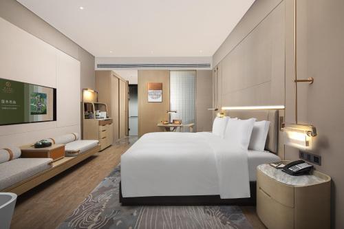 Cama o camas de una habitación en 宁波东钱湖望岚酒店