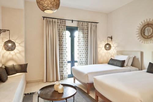 En eller flere senge i et værelse på Ali Pasha Hotel