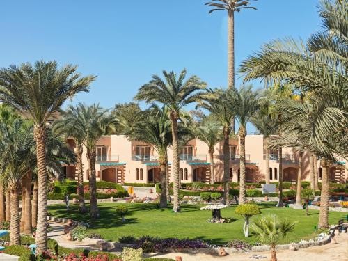 a view of a resort with palm trees at Club Paradisio El Gouna Red Sea in Hurghada