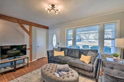 a living room with a couch and a tv at Stunning Seneca Home with Lake Keowee Access! in Seneca
