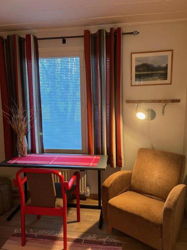 Un lugar para sentarse en Saarituvat Cottages