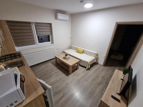 Posezení v ubytování City Premium Apartments