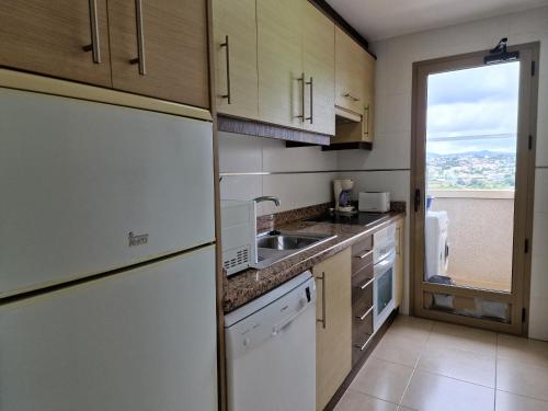 O bucătărie sau chicinetă la EDIFICIO LARIMAR