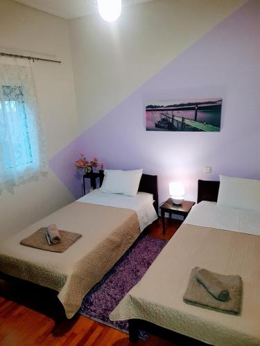 Postel nebo postele na pokoji v ubytování Marosrooms