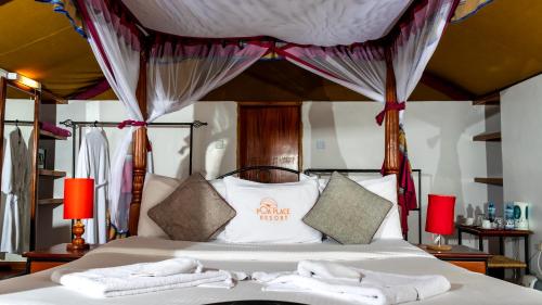 Giường trong phòng chung tại Poa Place Resort & Hotel - Where Nature Meets Comfort