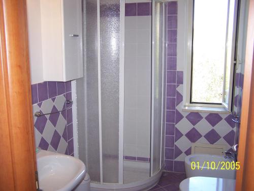 Koupelna v ubytování Residence Floritalia - Ricarica auto elettriche