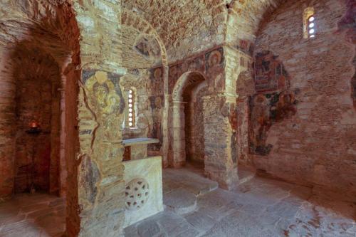 a stone room with a altar in a building at Fodele Beachfront Apts, Βy IdealStay Experience in Fodele