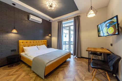 Ein Bett oder Betten in einem Zimmer der Unterkunft DayFlat Apartments Khreschatyk