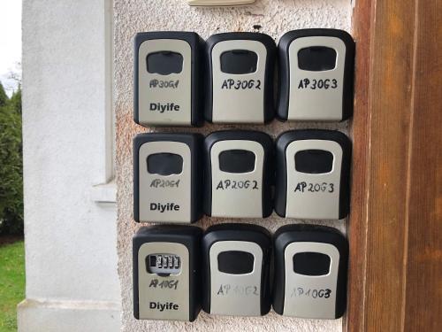 a group of four toasters on the side of a door at Flensburg Strandnah in Flensburg